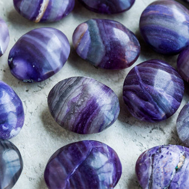 Silk fluorite palm stone