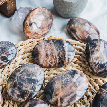 Black Sunstone Palm Stone