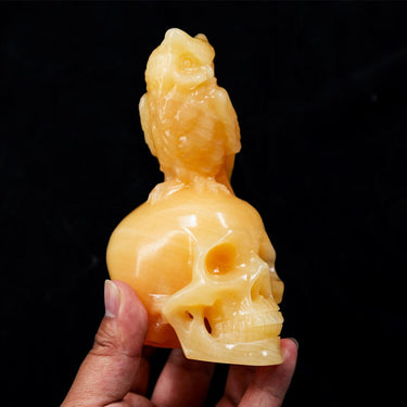 Orange Calcite Skulls With Owl