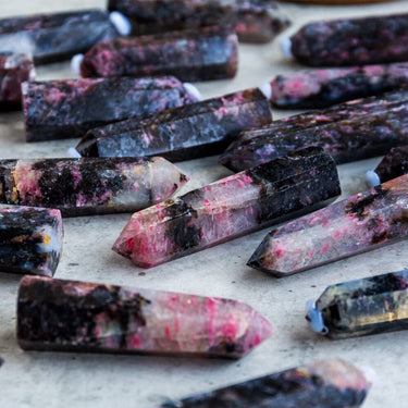 Rhodonite In Clear Quartz Point