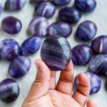 Silk fluorite palm stone